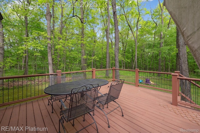 4121 Marsh Trl, Milford, MI 48380 - wooden terrace featuring outdoor dining area