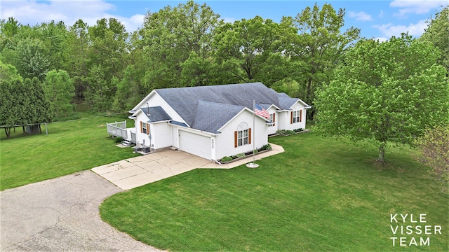 9020 5 Mile Rd NE, Ada, MI 49301 - view of front of house featuring concrete driveway, a front lawn, a garage, and a shingled roof