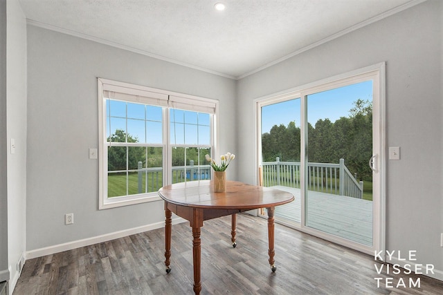 9020 5 Mile Rd NE, Ada, MI 49301 - dining room featuring plenty of natural light, crown molding, wood finished floors, baseboards, and recessed lighting