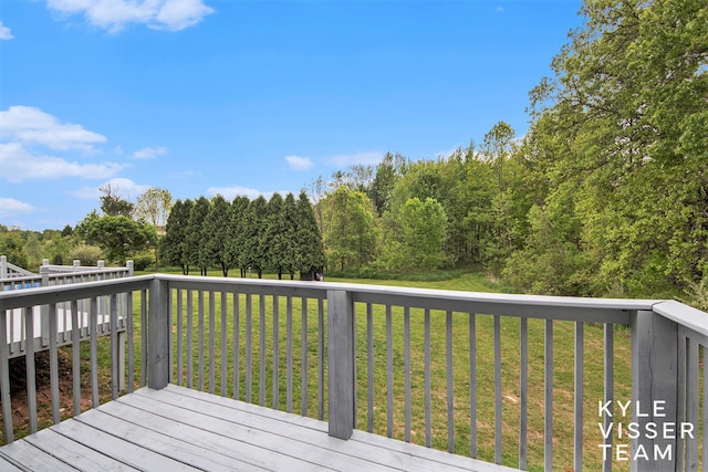 9020 5 Mile Rd NE, Ada, MI 49301 - deck with a lawn