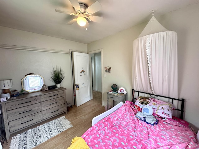 8251 Secor Rd, Lambertville, MI 48144 - bedroom with wood finished floors and ceiling fan