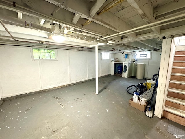 8251 Secor Rd, Lambertville, MI 48144 - below grade area featuring washing machine and clothes dryer and stairs