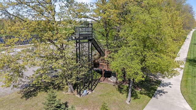 4624 Parman Rd, Stockbridge, MI 49285 - surrounding community featuring a wooden deck and stairway