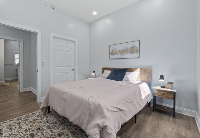 4624 Parman Rd, Stockbridge, MI 49285 - bedroom featuring baseboards, wood finished floors, and recessed lighting