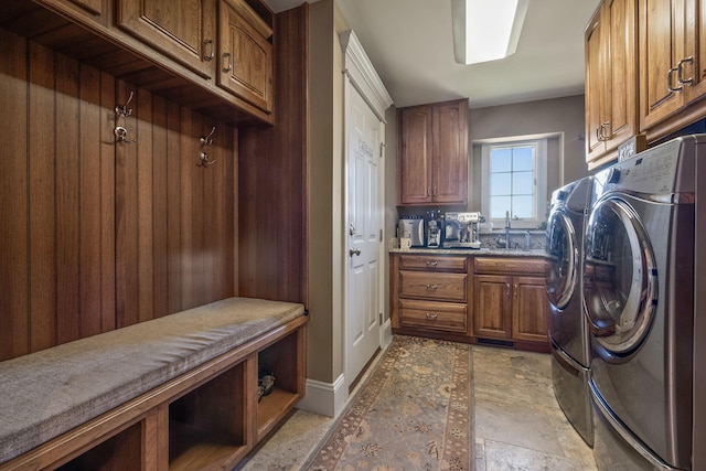 4624 Parman Rd, Stockbridge, MI 49285 - laundry room featuring washer and clothes dryer and cabinet space