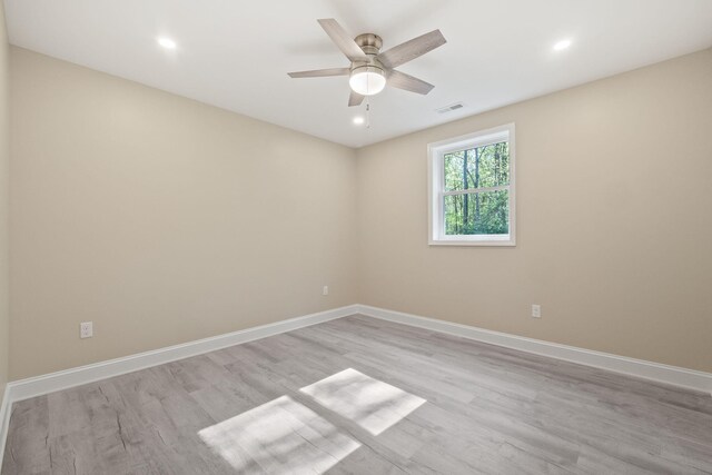 4624 Parman Rd, Stockbridge, MI 49285 - spare room with light wood-style flooring, baseboards, a ceiling fan, and recessed lighting