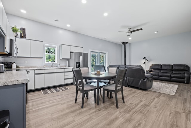4624 Parman Rd, Stockbridge, MI 49285 - dining space with ceiling fan, light wood-type flooring, healthy amount of natural light, and recessed lighting