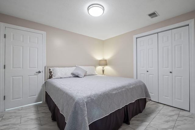 4624 Parman Rd, Stockbridge, MI 49285 - bedroom with light marble finish flooring and a closet