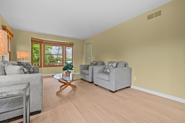 4900 Grass Lake Rd, White Lake, MI 48383 - living area featuring light wood finished floors and baseboards