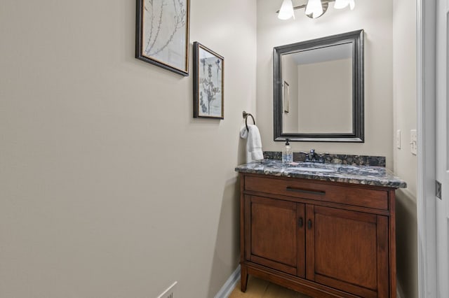 4900 Grass Lake Rd, White Lake, MI 48383 - bathroom featuring vanity and baseboards