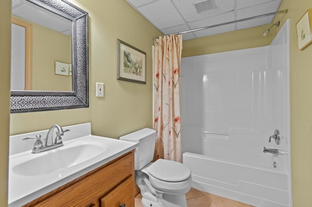 4900 Grass Lake Rd, White Lake, MI 48383 - full bathroom featuring tile patterned floors, shower / bath combination with curtain, toilet, vanity, and a drop ceiling