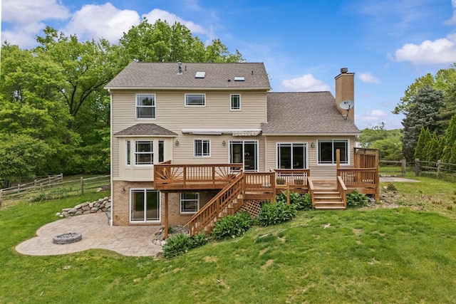 4900 Grass Lake Rd, White Lake, MI 48383 - back of house with a chimney, a wooden deck, stairway, and a patio