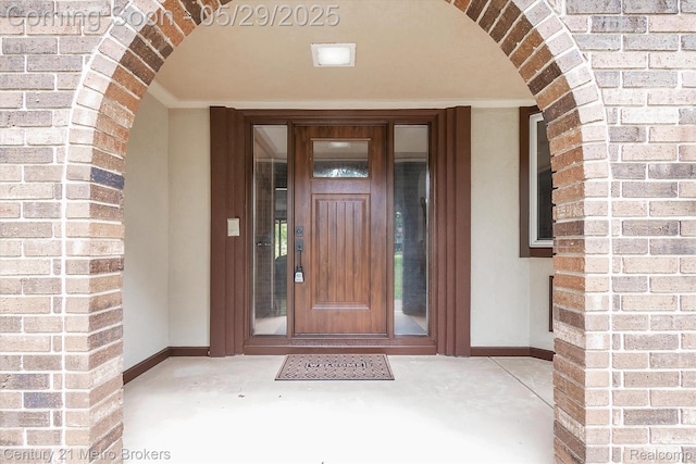 2232 Hayward St, Clio, MI 48420 - view of exterior entry with brick siding and stucco siding