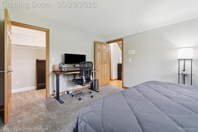 2232 Hayward St, Clio, MI 48420 - carpeted bedroom with baseboards and a desk