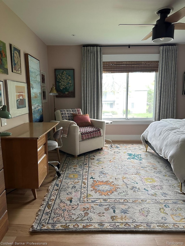 8401 Kennedy Cir N Unit 7, Warren, MI 48093 - bedroom featuring light wood finished floors and ceiling fan