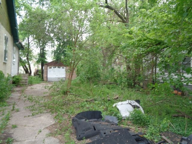 14876 Wisconsin St, Detroit, MI 48238 - view of yard with an outdoor structure