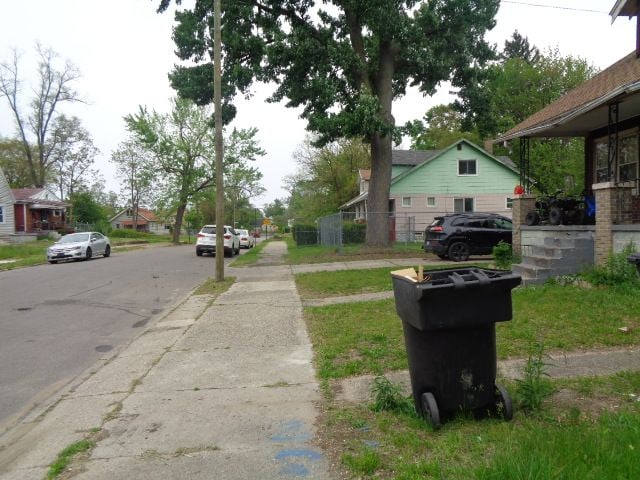 14876 Wisconsin St, Detroit, MI 48238 - view of asphalt street featuring sidewalks