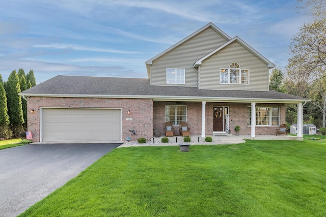 7130 Riesling St, Michigan, MI 49071 - traditional-style house with asphalt driveway, brick siding, and an attached garage