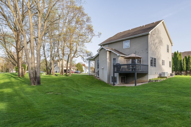 7130 Riesling St, Michigan, MI 49071 - back of house with a lawn, a deck, and central AC unit