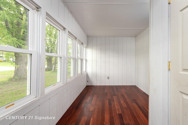 3320 N Sturgeon Rd, Midland, MI 48642 - unfurnished sunroom with wood-type flooring and wooden walls