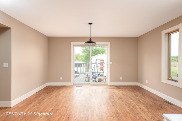 3320 N Sturgeon Rd, Midland, MI 48642 - empty room featuring light wood-style floors and baseboards