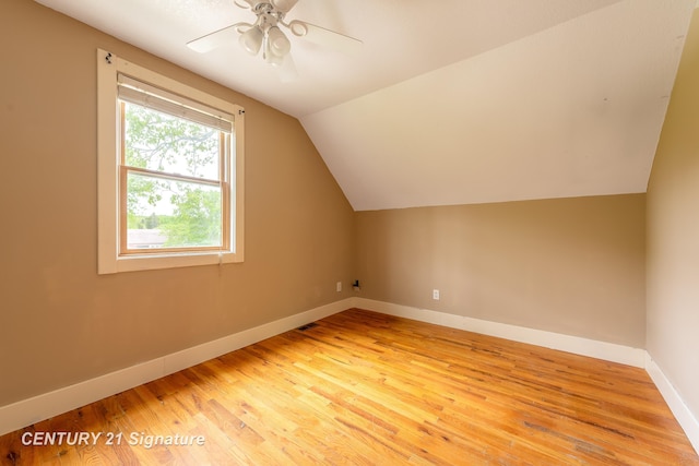 3320 N Sturgeon Rd, Midland, MI 48642 - additional living space featuring baseboards, wood finished floors, ceiling fan, and lofted ceiling