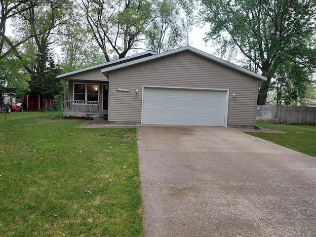1946 Catherine Ave, Muskegon, MI 49442 - view of front of property with driveway, covered porch, and an attached garage