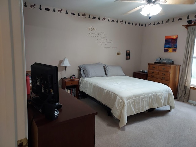 1946 Catherine Ave, Muskegon, MI 49442 - bedroom with light carpet and ceiling fan