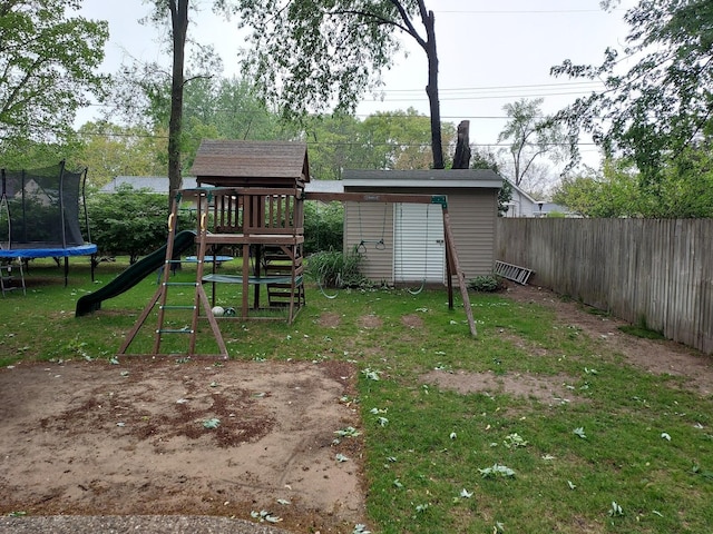 1946 Catherine Ave, Muskegon, MI 49442 - view of yard with a trampoline and a playground