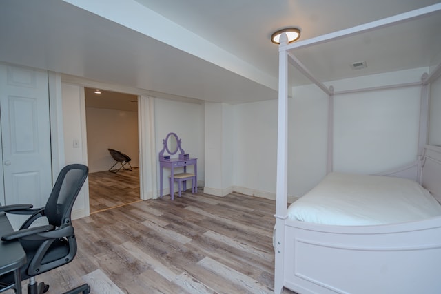 32904 Surow Dr, Warren, MI 48093 - bedroom featuring light wood-style flooring and a desk