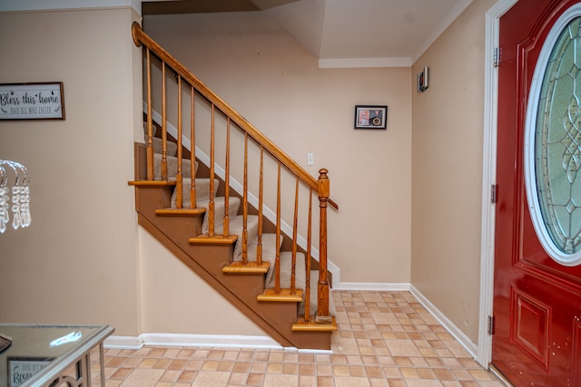 32904 Surow Dr, Warren, MI 48093 - entryway with baseboards, stairs, and ornamental molding