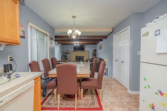 32904 Surow Dr, Warren, MI 48093 - dining area featuring a chandelier, a fireplace, baseboards, and beam ceiling