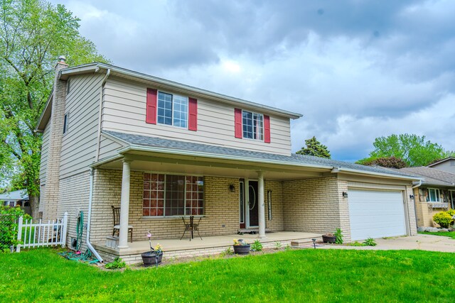 32904 Surow Dr, Warren, MI 48093 - traditional home featuring covered porch, brick siding, a garage, and concrete driveway