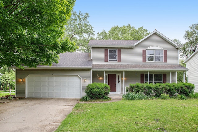 traditional-style home featuring an attached garage, concrete driveway, a front lawn, a porch, and roof with shingles