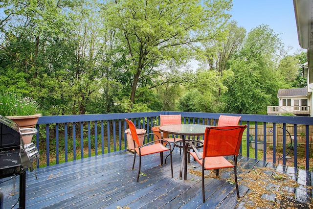 deck featuring outdoor dining space