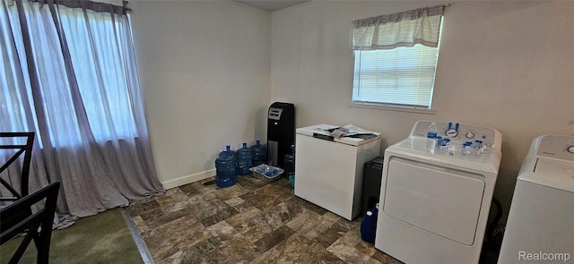 5471 Fairhaven St, Flint, MI 48505 - washroom with separate washer and dryer and stone finish flooring