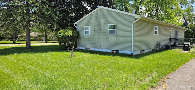 5471 Fairhaven St, Flint, MI 48505 - view of side of home with central AC and a yard
