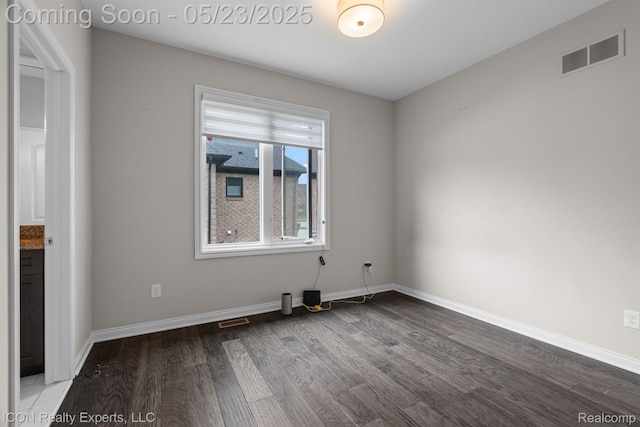 14153 Jode Park, Utica, MI 48315 - unfurnished room featuring wood finished floors and baseboards