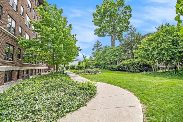 surrounding community with a yard