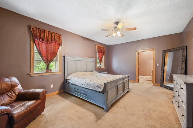 113 W Chicago St, Buchanan, MI 49107 - bedroom featuring light colored carpet, baseboards, ceiling fan, and a textured ceiling