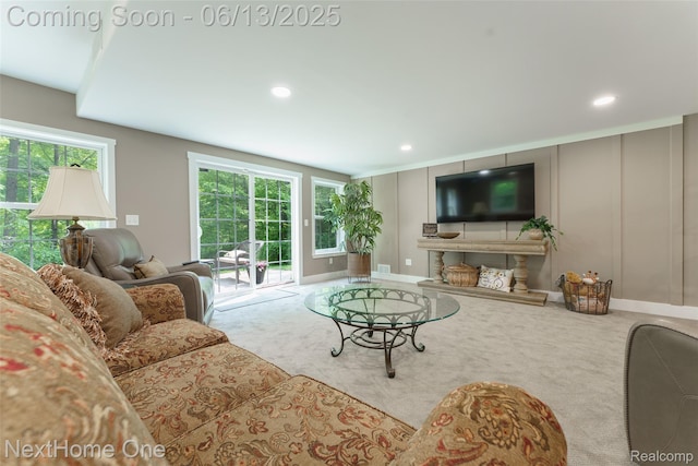 17351 Timber Crk, Holly, MI 48442 - living area with carpet flooring, recessed lighting, and a decorative wall