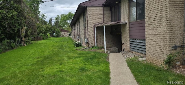 995 N Cass Lake Rd Unit 233, Waterford, MI 48328 - view of side of home with brick siding