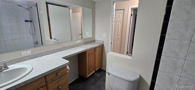 995 N Cass Lake Rd Unit 233, Waterford, MI 48328 - full bathroom featuring vanity, toilet, and a tile shower