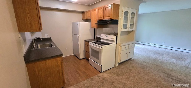 995 N Cass Lake Rd Unit 233, Waterford, MI 48328 - kitchen featuring white appliances, a sink, under cabinet range hood, a baseboard heating unit, and white cabinets