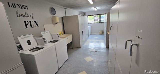 995 N Cass Lake Rd Unit 233, Waterford, MI 48328 - community laundry room featuring independent washer and dryer and light floors