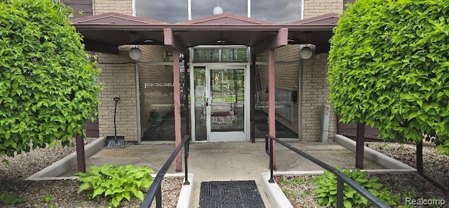 995 N Cass Lake Rd Unit 233, Waterford, MI 48328 - property entrance with brick siding