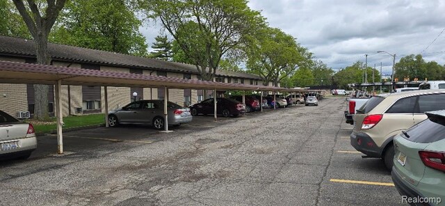 995 N Cass Lake Rd Unit 233, Waterford, MI 48328 - view of covered parking lot
