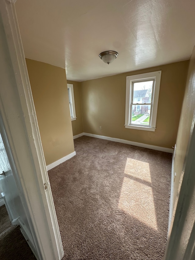 9982 Littlefield St, Detroit, MI 48227 - carpeted spare room featuring plenty of natural light and baseboards