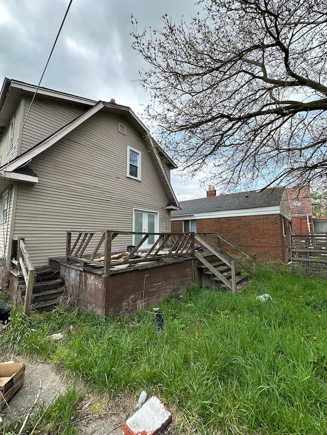 9982 Littlefield St, Detroit, MI 48227 - back of house with a deck and stairway