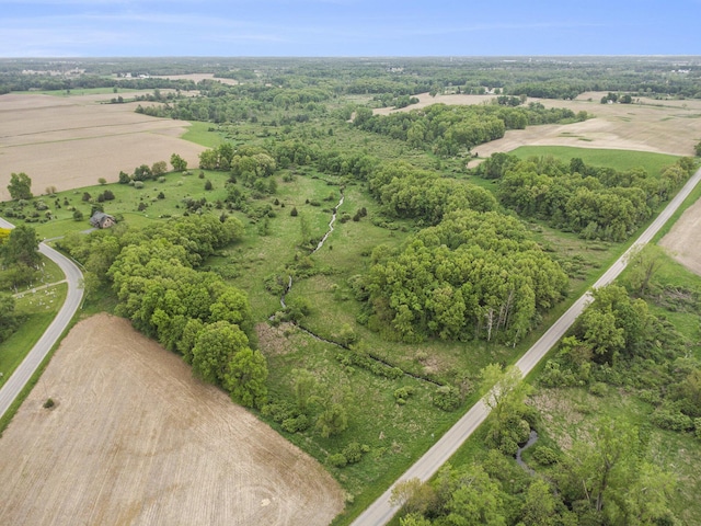 aerial view of property and surrounding area with rural landscape